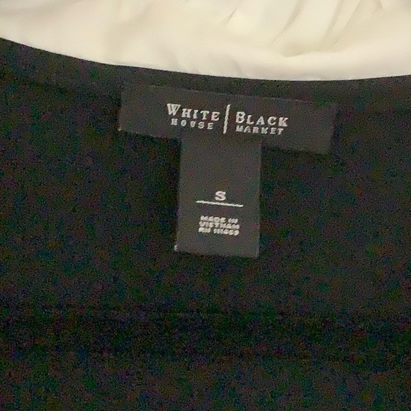 White House black market black top with white ruffled neck and sleeves. - Picture 3 of 6